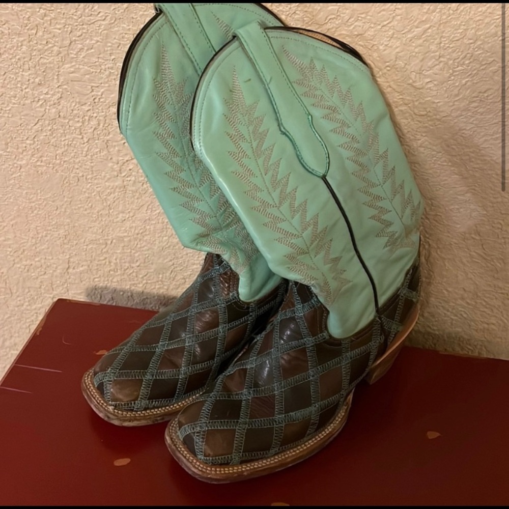 Teal and brown woman’s leather boots